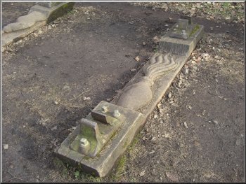 One of a series of carved sleepers set in the old railway bed