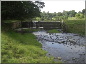 Outlet weir from the lake in the deer park