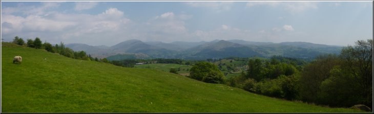 Looking across the hills towards Lake Windermere from the lane above Knipe Fold