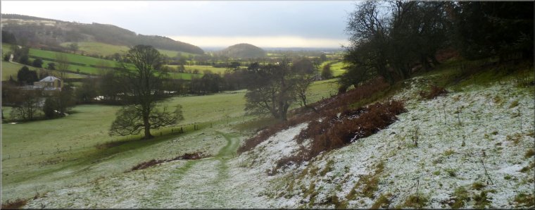Looking south down the valley of Lunshaw Beck to the little round hill called Skipton Hill
