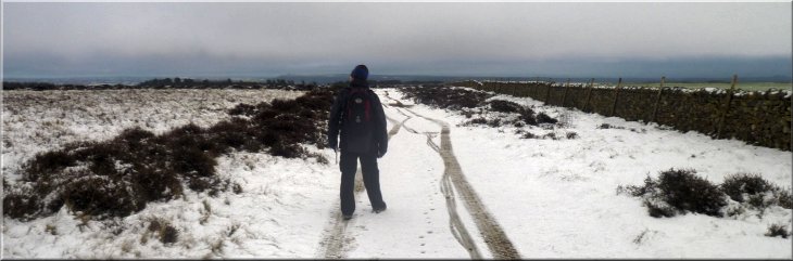 Snowy footpath across the moor from the drove road 
