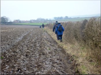 The path along the edge of a ploughed field 
