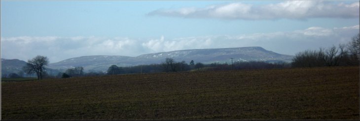 The distinctive shape of Pen Hill in Wensleydale seen from the road near High Pond House
