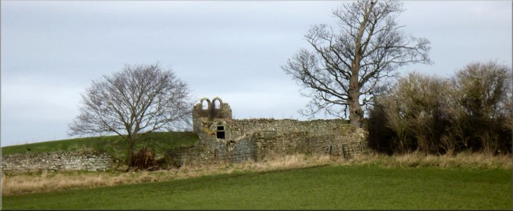 An intiguing ruin seen from the lane near Cowling