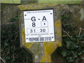 Marker on the line of a petrochemical pipeline carrying chemicals between Runcorn in Cheshire and Wilton on Teesside