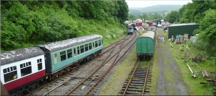 Looking east to the old Kirkby Stephen station where rollingstock is parked on a short stretch of remaining track