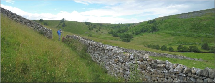 Following the path with a stone wall on our right above Telfit Farm