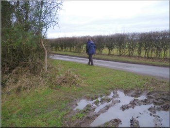 Turning on to a minor road from a muddy field gateway
