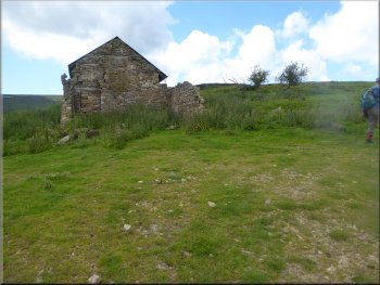 Turning right at the gable end of the ruined outbuilding