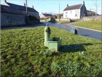 Old water trough on the green in Cropton