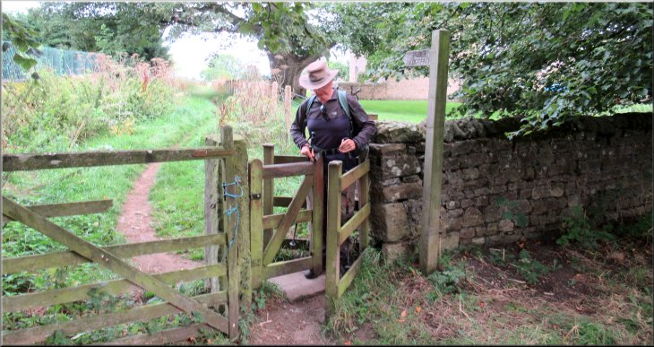 Kissing Gate off the B6274 to the field path to Hartforth