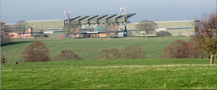 The grandstand and other buildings at Beverley Racecourse seen from Blackmill
