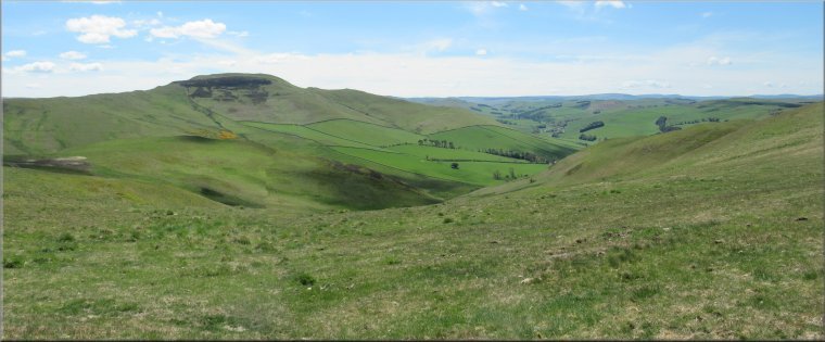 Looking south from the ridge east of Grubbit Law to the ancient fortified hill top of Hownam Law about 2km away