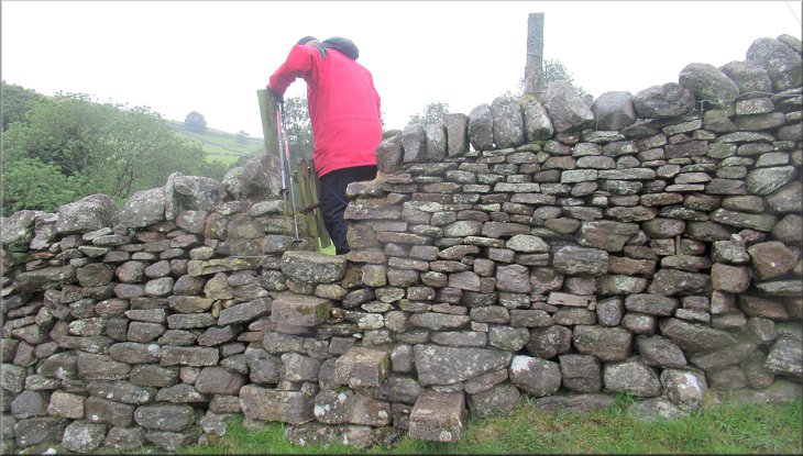 Over this stile we followed a path next to a wall on our right bending to our right up the hillside