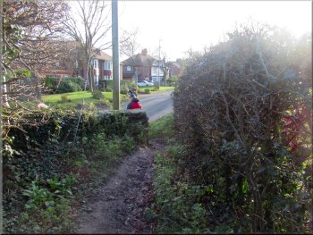 Turning right from the path onto Manygates Lane
