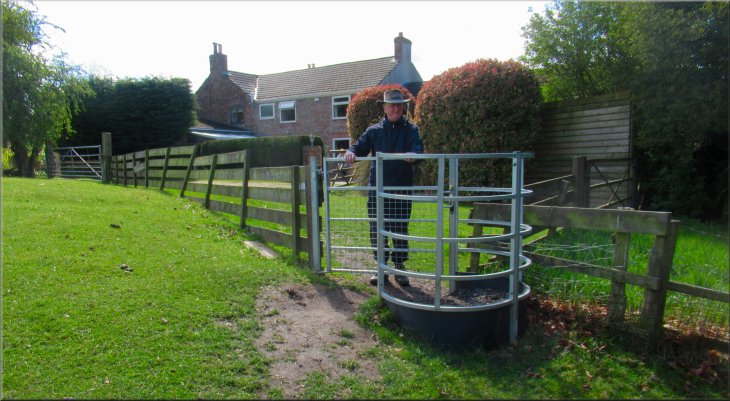 Kissing gate from the field path to the village street in Catton