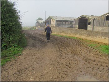Rounding a left hand bend past the farm buildings
